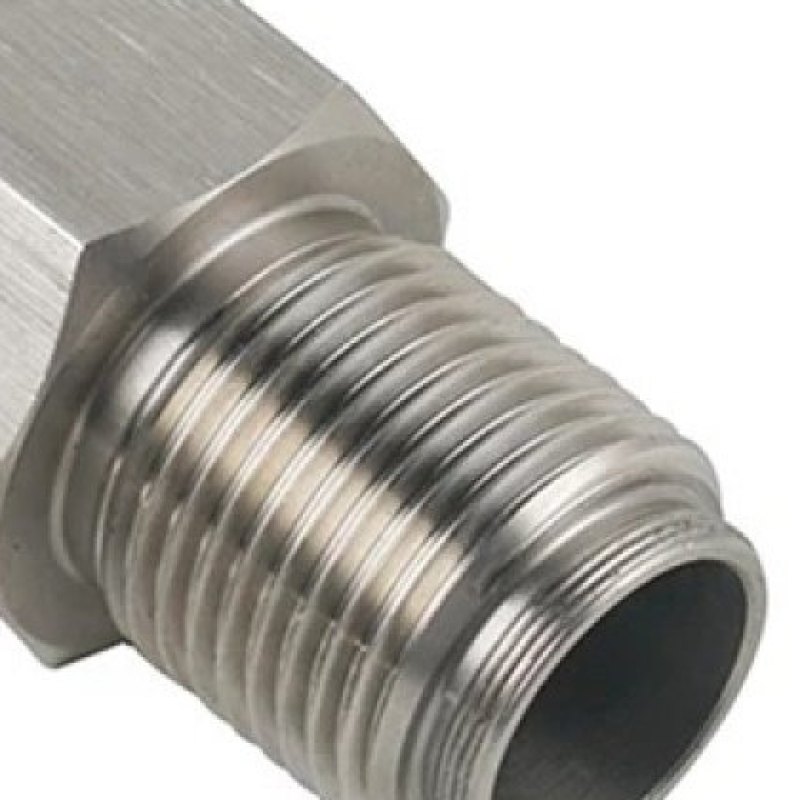 Close-up of the machined M18 × 1.5 male thread and bore of the stainless steel spacer